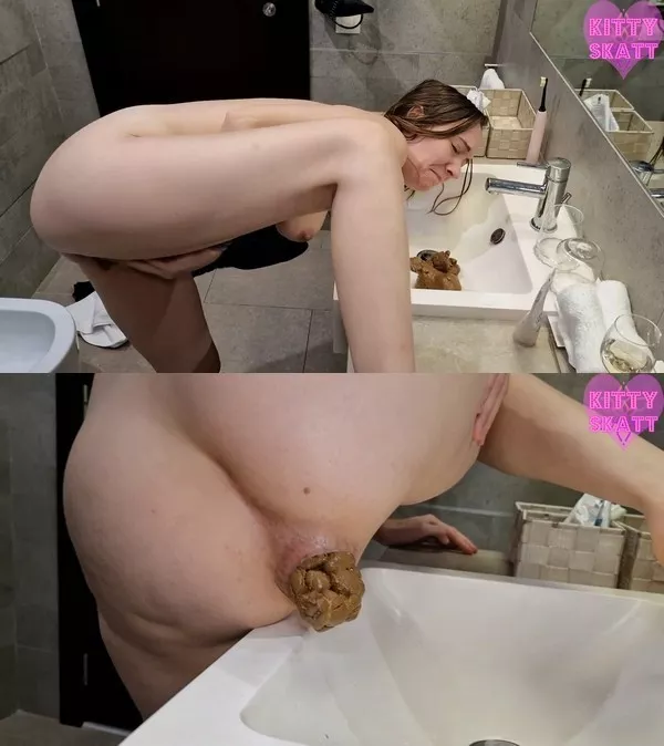 小猫斯卡特努力保持，水槽全都被它吞没